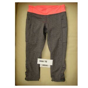 Ivivva Girl by Lululemon 🍋Quick Trick Crop grey  with orange waistline size 10